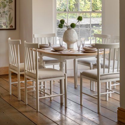 Gallery Direct Eton Round Extending Dining Table & 6 Upholstered Chairs in White Gallery Direct Eton Round Extending Dining Table & 6 Upholstered Chairs in White
