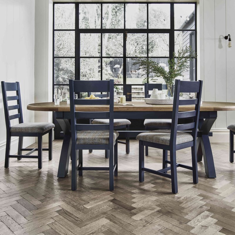 Heritage Editions Blue 2.25m Extending Oval Dining Table And 4 Ladder Back Chairs lifestyle image of the dining set