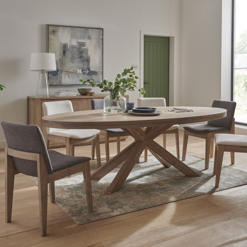 Falun Oval Dining Table With 6 Dining Chairs lifestyle image of the dining set