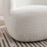 Alma Ivory Swivel Chair close up lifestyle image of the chair