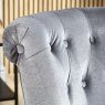 Monty Silver Accent Chair close up lifestyle image of the chair