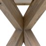 Falun Oval Dining Table close up image of the leg detailing of the table on a white background