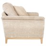 Ercol Sandford Snuggler Chair side on image of the chair on a white background