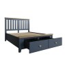 Heritage Editions Blue King Size Wooden Bed Frame angled image of the bed with an open drawer on a white background