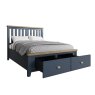 Heritage Editions Blue King Size Wooden Bed Frame lifestyle image of the bed with open drawerson a white background