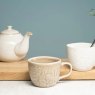 Siip Leaf Embossed Mug Beige lifestyle